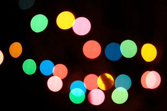 a blurry photo of colorful lights in the dark