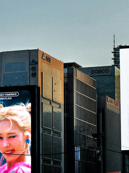 a billboard with a picture of a woman on it