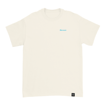 G-Dragon Übermensch t-shirt in natural – front view with blue chest wordmark