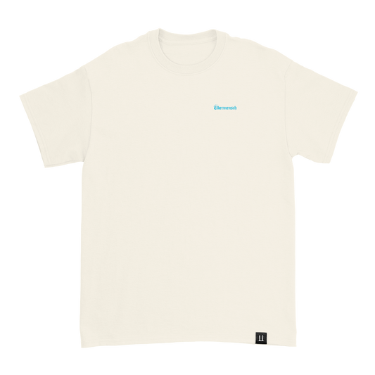 G-Dragon Übermensch t-shirt in natural – front view with blue chest wordmark