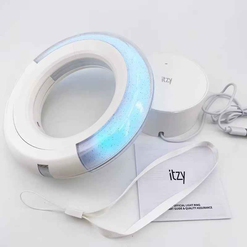 Lightstick Shop official ITZY light ring with white circular design, glowing blue accents, base, and wrist strap.