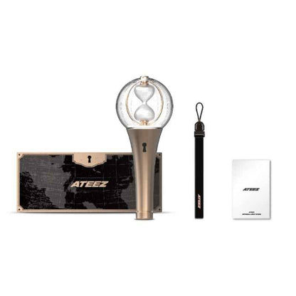 Lightstick Shop ATEEZ Ver.2 LIGHTINY lightstick with globe and hourglass design, wrist strap, and manual.
