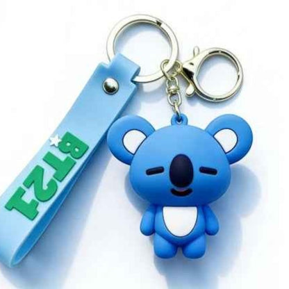 Lightstick Shop BT21 3D Koya silicone keychain with a blue wristlet strap featuring green BT21 branding