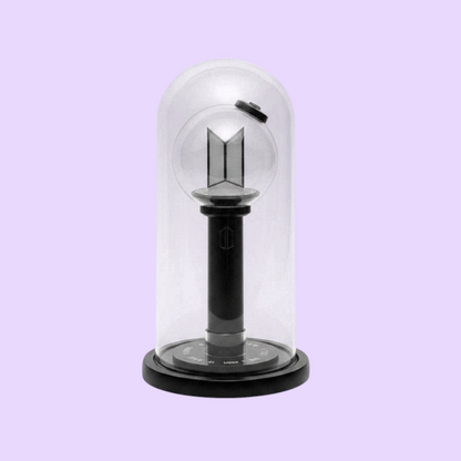Lightstick Shop glass display dome with black base protecting a BTS Army Bomb lightstick on a white background