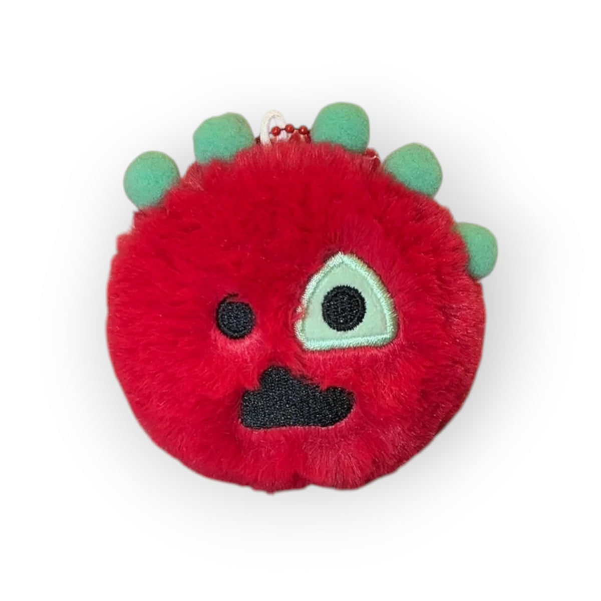 CORTIS Ball plush keychain in red with green spikes and a quirky embroidered face
