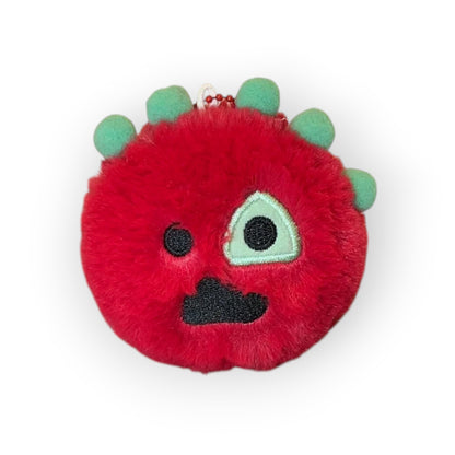 CORTIS Ball plush keychain in red with green spikes and a quirky embroidered face