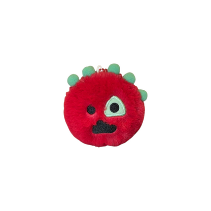 CORTIS Ball plush keychain in red with green spikes and a quirky embroidered face