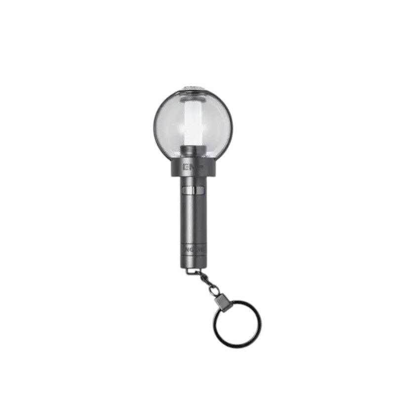 Lightstick Shop ENHYPEN mini lightstick keychain with a glowing white light and silver handle. Features a keyring attachment.
