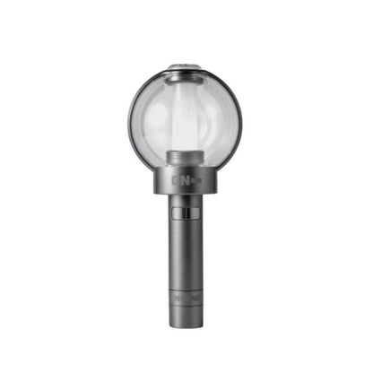 Lightstick Shop ENHYPEN official lightstick with a clear globe and dark grey handle. Features Bluetooth connectivity.