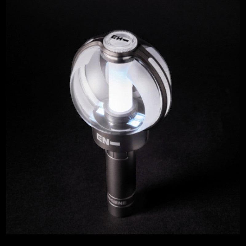 Lightstick Shop ENHYPEN official lightstick with a clear orb, white light, and silver accents. Features 'EN-' logo.
