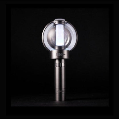 Lightstick Shop ENHYPEN Official Lightstick with a clear globe and white light, silver handle with ENGENE logo.