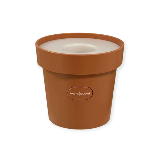 Lightstick Shop G-Dragon daisy light stick cradle in a terracotta flowerpot design with ambient desk lamp base.