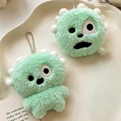 Green plush monster keychain with soft fabric and metal ball chain