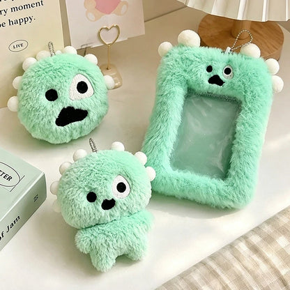 Green plush monster photocard holder set with cute embroidered faces