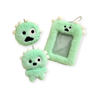 Green plush monster photocard holder with clear card window, CORTIS Ball style keychain