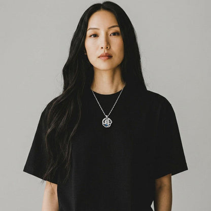 Lightstick Shop minimalist silver clavicle chain necklace inspired by ZB1 Han Yujin worn by a woman in a black tee