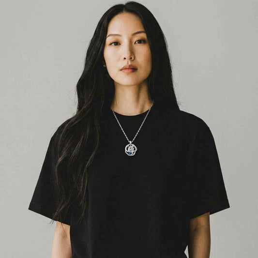 Lightstick Shop minimalist silver clavicle chain necklace inspired by ZB1 Han Yujin worn by a woman in a black tee