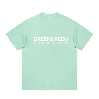 CORTIS GREENGREEN mint green cotton t-shirt with white wordmark and coordinates print