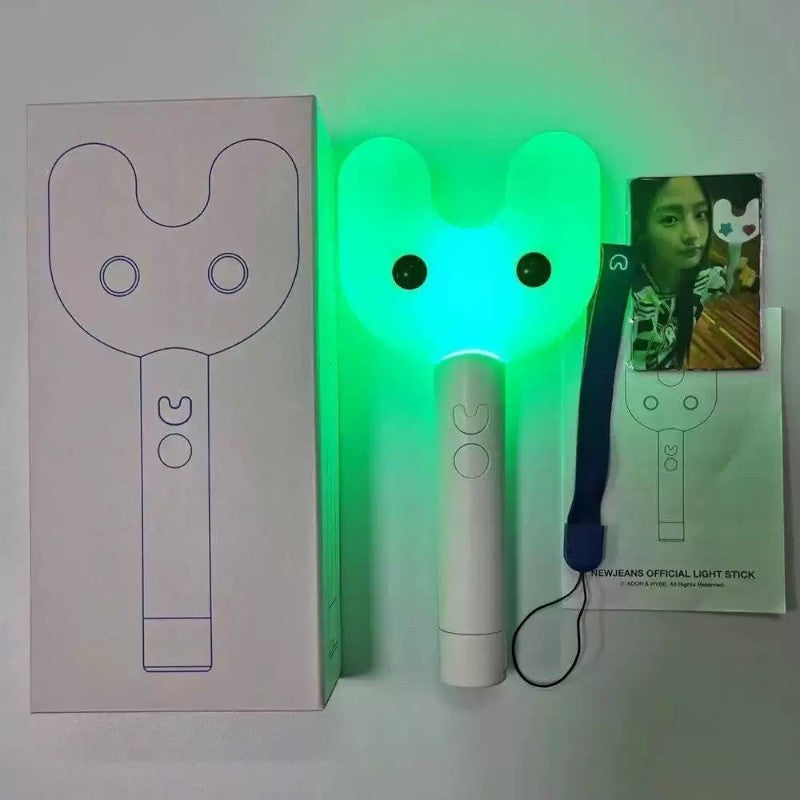 Lightstick Shop NewJeans Binky Bong rabbit-shaped lightstick glowing green with included photocard and packaging box