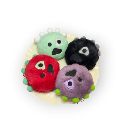 CORTIS Ball plush keychains grouped, showing all four colourways with metal clips