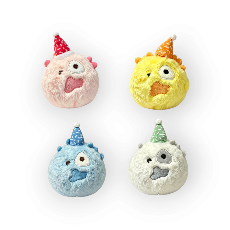 CORTIS Ball birthday plush in pink, yellow, blue, and white with felt party hats