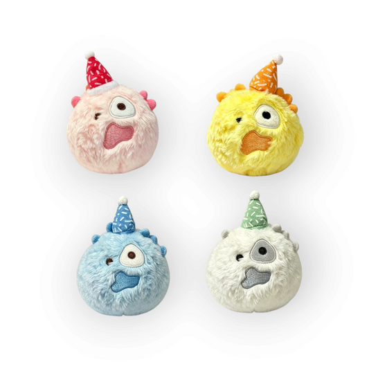 CORTIS Ball birthday plush in pink, yellow, blue, and white with felt party hats