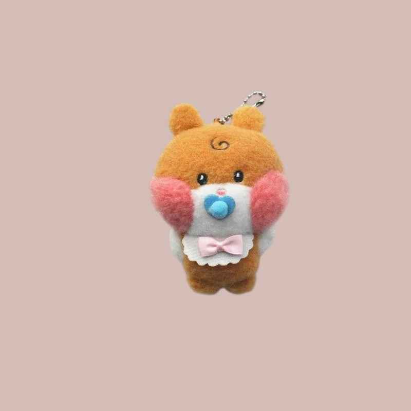 Lightstick Shop Zeroni plush mascot doll, a brown hamster-like character with pink cheeks, a white bib, and a blue pacifier.
