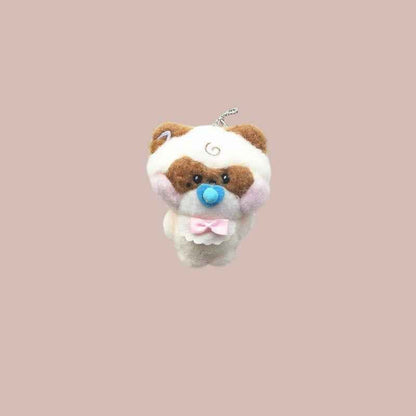 Lightstick Shop Zeroni plush mascot doll, a tan and white animal with brown markings, blue pacifier, and pink bow.