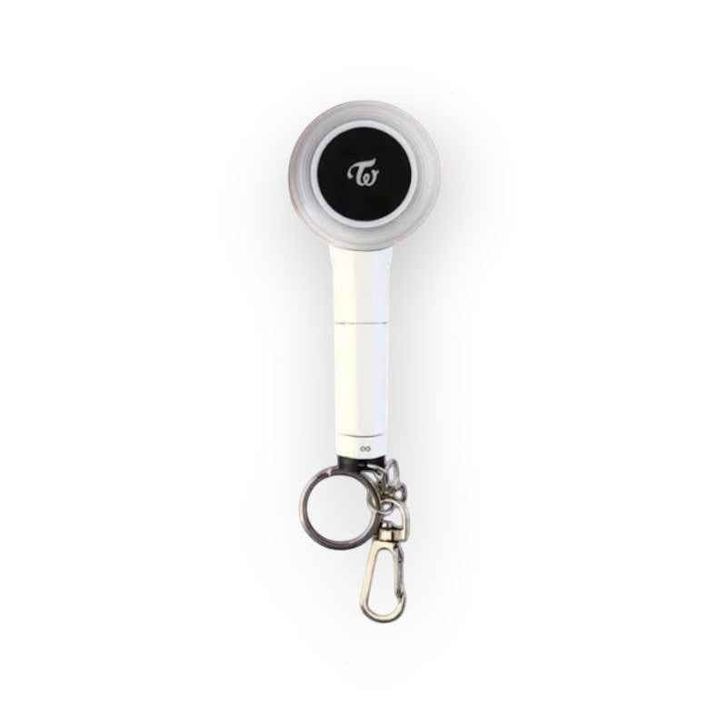 Lightstick Shop TWICE Candy Bong mini lightstick keychain with white handle and black logo on a pastel grid background