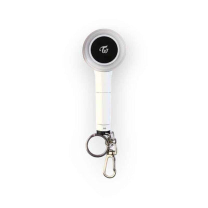 Lightstick Shop TWICE Candy Bong mini lightstick keychain with white handle and black logo on a pastel grid background